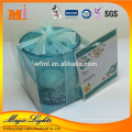 Individuelle Geschenkverpackung Teelicht mit farbigem Glashalter